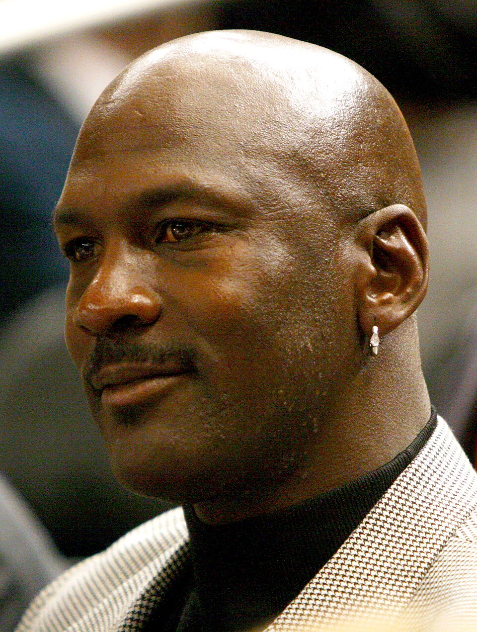 Michael Jordan attending a basketball game in 2006